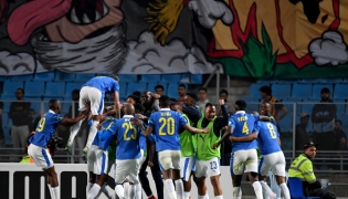 Sundowns' players celebrate after scoring their first goal during the CAF Champions League semi-final first leg football match between Esperance Sportive de Tunis (TUN) and Mamelodi Sundowns (RSA) at the Hammadi Agrebi Stadium in Rades on April 12, 2026. (Photo by FETHI BELAID / AFP)