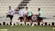 Al Ahli players attend a training session. 