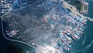 This handout photo taken and released by Malaysia's Sandakan Fire and Rescue Department on April 19, 2026, shows a general view of the Kampung Bahagia water village after a fire, in Sandakan, on Malaysia's Borneo island. (Photo by Handout / Malaysia's Sandakan Fire and Rescue Department / AFP)