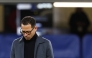 (FILES) Chelsea's English head coach Liam Rosenior looks down ahead of the UEFA Champions League round of 16 second leg football match between Chelsea FC and Paris Saint-Germain (PSG) at Stamford Bridge, west London on March 17, 2026. (Photo by FRANCK FIFE / AFP)