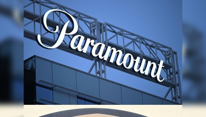 (COMBO) This combination of files pictures created on December 22, 2025 shows the Paramount logo (TOP) displayed at Columbia Square along Sunset Blvd in Hollywood, California on March 9, 2023 and the WB logo on the exterior of Warner Bros. Studios, Burbank in Burbank, California on October 21, 2025. Photo by Patrick T. Fallon and Robyn Beck / AFP