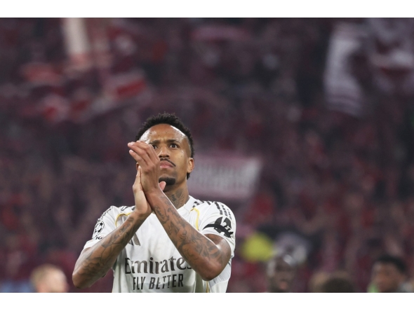 Real Madrid's Brazilian defender #03 Eder Militao greets the fans after the end of the UEFA Champions League quarter-final second leg football match between FC Bayern Munich and Real Madrid in Munich, southern Germany, on April 15, 2026. (Photo by Karl-Josef HILDENBRAND / AFP)