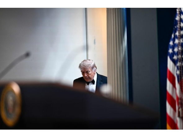 US President Donald Trump arrives to speak during a press briefing in the Brady Briefing Room at the White House in Washington, DC, shortly after a shooting incident at the White House Correspondents’ Dinner. (Photo by Kent Nishimura / AFP)
 