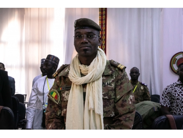 (FILES) Colonel Sadio Camara, Minister of Defense and Veterans of Mali, is seen at the meeting of Ministers of the Alliance of Sahel States (AES), Ouagadougou, (Photo by FANNY NOARO-KABRة / AFP)