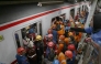 Rescuers work at the train accident site in Bekasi, Indonesia. A commuter train on the Jakarta-Bekasi route was involved in a collision with a long-distance train operating on the Jakarta-Surabaya route at around 8:50pm local time on Monday. (Photo by B. Nugraha/Xinhua)