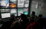 Pilots specializing in underwater robots from the French Navy, along with researchers, watch live feeds on screens showing the “ROV C 4000,” a remotely operated vehicle manufactured by the French company LD Travocean and designed for seabed exploration, during an archaeological mission on the wreck of the CAMARA 4 from the bridge of the (BSAA) Jason, off the coast of Ramatuel, in southeastern France, April 7, 2026. Photo by Thibaud MORITZ / AFP