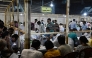 Election officials count votes after the West Bengal Legislative Assembly elections at the Netaji Indoor Stadium in Kolkata on May 4, 2026. 
 (Photo by Dibyangshu SARKAR / AFP)