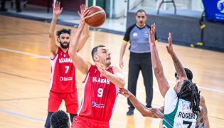 Al Arabi's Elmedin Kikanovic attempts to score.