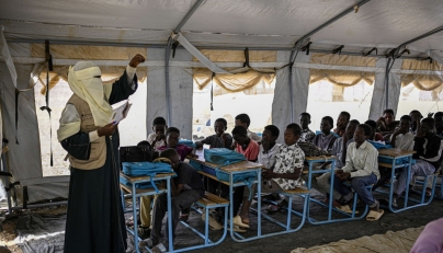 Displaced Sudanese students attend a class at an elementary school, south of Port Sudan, on April 26, 2026. Photo by Khaled Desouki / AFP
