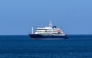 A general view of the cruise ship MV Hondius stationary off the port of Praia, the capital of Cape Verde, on May 3, 2025. Photo by AFP