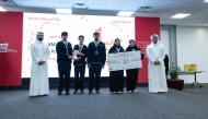 First place wining team with the officials during the award ceremony.