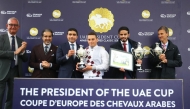 The connections of Lacaro Du Croate receive their awards after the Mansoor Khalil M. Al-Shahwani-owned mare won the President of the UAE Cup at ParisLongchamp yesterday.