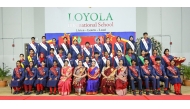 Principal Bhavna Vijaykumar S with teachers and newly elected members of the Student Council.