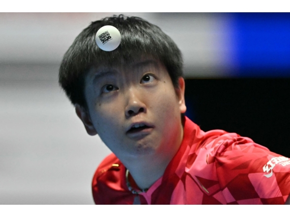 Festivities for table tennis world champion Sun Yingsha's 25th birthday included messages on massive digital billboards, a drone show and packed fan gatherings at shopping malls across the country. (Photo by Glyn Kirk / AFP)
