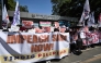 Protesters holding banners protest in support of the impeachment of Philippine Vice-President Sara Duterte in front of the House of Representatives in Quezon City, Metro Manila  (Photo by Ted  Aljibe / AFP)