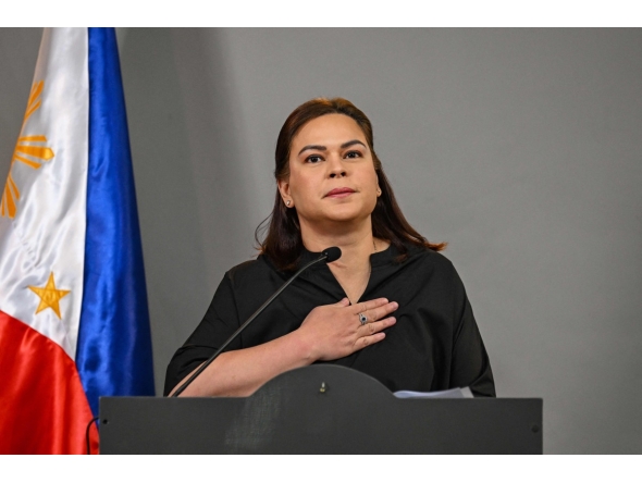 (FILES) Philippine Vice President Sara Duterte announces her intention to run for the country's presidency in 2028 during a press conference in Mandaluyong, Metro Manila on February 18, 2026. (Photo by Jam STA ROSA / AFP)