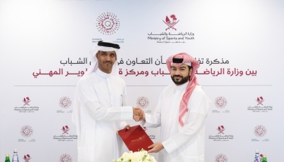 Assistant Undersecretary for Youth Affairs at the Ministry of Sports and Youth, Ahmed Mohammed Al-Harami and Executive Director of QCDC, Saad Abdulla Al-Kharji (left) at the MoU signing.