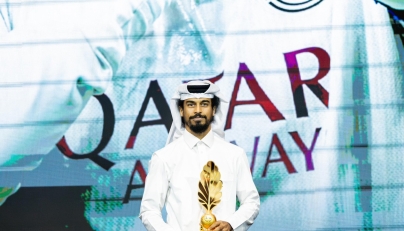 Al Sadd's Akram Afif with the Best Player Award.