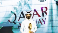 Al Sadd's Akram Afif with the Best Player Award.