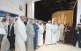Officials touring exhibitors on the opening day of the summit yesterday. 