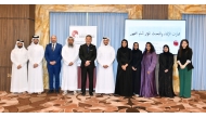 Officials pose for a group photo with the participants of public speaking training programme.