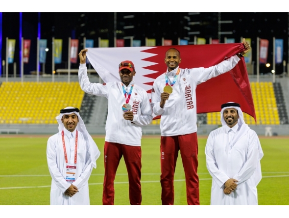 Mutaz Barshim (right) and his father Essa Barshim share a proud moment with their medals after a memorable night at the 4th GCC Games Doha 2026.