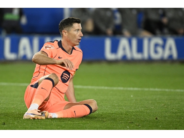Barcelona's Polish forward #09 Robert Lewandowski reacts during the Spanish league football match between Deportivo Alaves and FC Barcelona at Mendizorroza Stadium in Vitoria on May 13, 2026. Photo by ANDER GILLENEA / AFP
