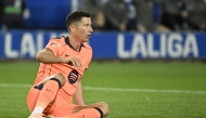 Barcelona's Polish forward #09 Robert Lewandowski reacts during the Spanish league football match between Deportivo Alaves and FC Barcelona at Mendizorroza Stadium in Vitoria on May 13, 2026. Photo by ANDER GILLENEA / AFP