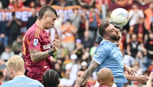 Roma's Italian defender #23 Gianluca Mancini heads the ball and scores his team's second goal during the Italian Serie A football match between Roma and Lazio at Olympic stadium in Rome on May 17, 2026. (Photo by Isabella BONOTTO / AFP)