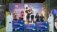 Officials honour the winning teams during the closing ceremony.