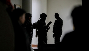 Soldiers and security personnel are seen inside the Philippine Senate complex in Pasay City, the Philippines, on May 13, 2026 in an attempted arrest of Senator Ronald Dela Rosa.  (Xinhua)