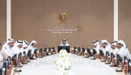 Minister of Commerce and Industry H E Sheikh Faisal bin Thani bin Faisal Al Thani with other officials during the meeting.