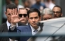 US Secretary of State Marco Rubio gestures as he walks out of the international headquarters of Missionaries of Charity known as the 