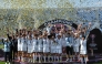 Naegohyang Women's FC players celebrate with the trophy during the victory ceremony after the AFC Women's Champions League final football match between North Korea's Naegohyang Women's FC and Japan's Tokyo Verdy Beleza in Suwon on May 23, 2026. (Photo by Jung Yeon-je / AFP)
