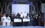 Officials and winners during the ceremony.