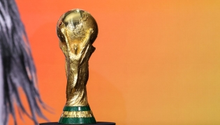 The 2026 FIFA World Cup winner's trophy is seen on stage at the 2026 World Cup halftime show announcement in New York City on May 14, 2026. (Photo by Charly Triballeau / AFP)
