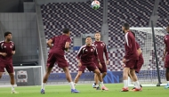 Qatar players during a training session at the Khalifa International Stadium yesterday. PICS: Hana Ramadan/The Peninsula