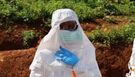 A medical worker puts on protective suits before the burial of an Ebola victim in Mongbwalu, Ituri province, eastern Democratic Republic of the Congo (DRC), May 24, 2026. Photo for representational purposes only. (Str/Xinhua)
