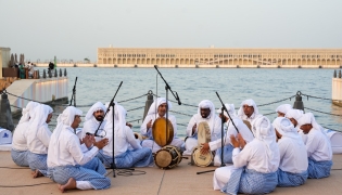 Performers reenacting the seafaring tradition during the Eid Al Adha celebrations at the Old Doha Port yesterday. PIC: Mohammed Al Attar / The Peninsula
