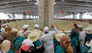 Muslims pilgrims perform the symbolic 