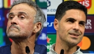 Paris Saint-Germain's Spanish headcoach Luis Enrique (L) and Arsenal's Spanish manager Mikel Arteta address a MD-1 press conference on May 29, 2026, the eve of the UEFA Champions League final football match between Paris Saint-Germain (PSG) and Arsenal at the Puskas Arena in Budapest. (AFP)
