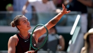 Aryna Sabalenka celebrates her victory at the end of her women's singles match against Australia's Daria Kasatkina on day 7 of the French Open tennis tournament on Court Suzanne-Lenglen at the Roland-Garros Complex in Paris on May 30, 2026. (Photo by Anne-Christine POUJOULAT / AFP)