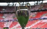 The trophy is displayed on the pitch prior to the UEFA Champions League final football match between Paris Saint-Germain (PSG) and Arsenal FC at the Puskas Arena in Budapest on May 30, 2026. (Photo by FRANCK FIFE / AFP)