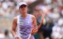 Poland's Iga Swiatek reacts as she plays against Ukraine's Marta Kostyuk during their women's singles match on day 8 of the French Open tennis tournament on Court Philippe-Chatrier at the Roland-Garros Complex in Paris on May 31, 2026. (Photo by Anne-Christine Poujoulat / AFP)