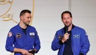 (Files) ESA (European Space Agency) French astronaut Thomas Pesquet (R) next to French astronaut Arnaud Prost addresses the audience at the presidential Elysee Palace in Paris on February 5, 2026. (Photo by Ludovic Marin / Pool / AFP)