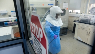 A researcher works inside the Viral Hemorrhagic Fever Laboratory at the Uganda Virus Research Institute in Entebbe, Uganda. File photo for representation.