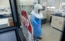 A researcher works inside the Viral Hemorrhagic Fever Laboratory at the Uganda Virus Research Institute in Entebbe, Uganda. (Xinhua/Nie Zuguo)