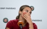 Aryna Sabalenka reacts during a press conference after being defeated by Diana Shnaider during their women's quarter final singles match on day 11 of the French Open tennis tournament on Court Philippe-Chatrier at the Roland-Garros Complex in Paris on June 3, 2026. (Photo by Sébastien DUPUY / AFP)
