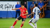 Son Heung-Min #13 of Korea Republic looks for a pass around Brayan Landaverde #8 of El Salvador during the second half of the international friendly match on June 03, 2026 in Provo, Utah. Alex Goodlett/Getty Images/AFP 