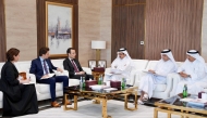 QC Chairman Sheikh Khalifa bin Jassim bin Mohammed Al Thani with the Ambassador of France to Qatar, H E Arnaud Pescheux, and other officials during the meeting. 